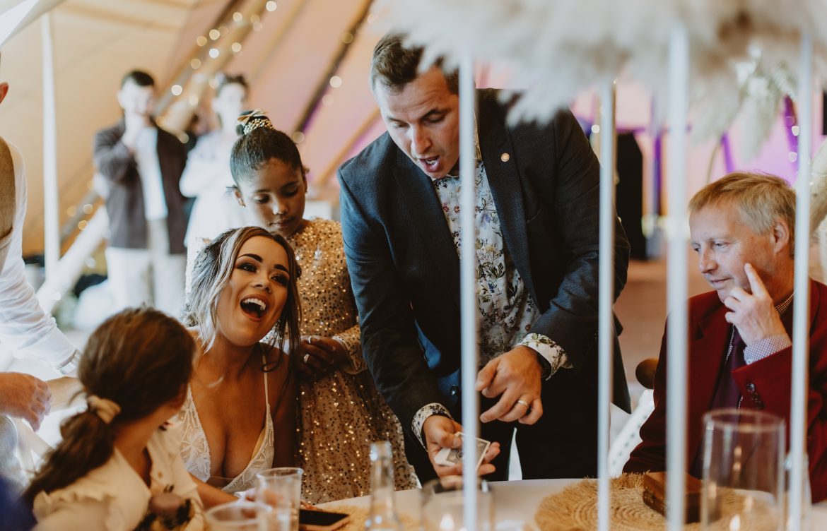 Why Every Wedding Needs a Magician (Yes, Really)
